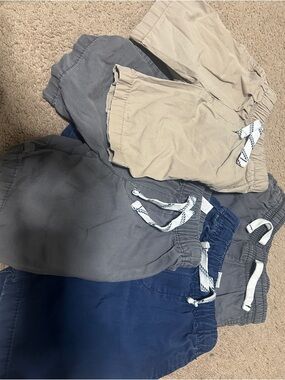 4 pairs of Carter's Elastic Waist Pull-On Shorts in Navy, Gray, and Khaki